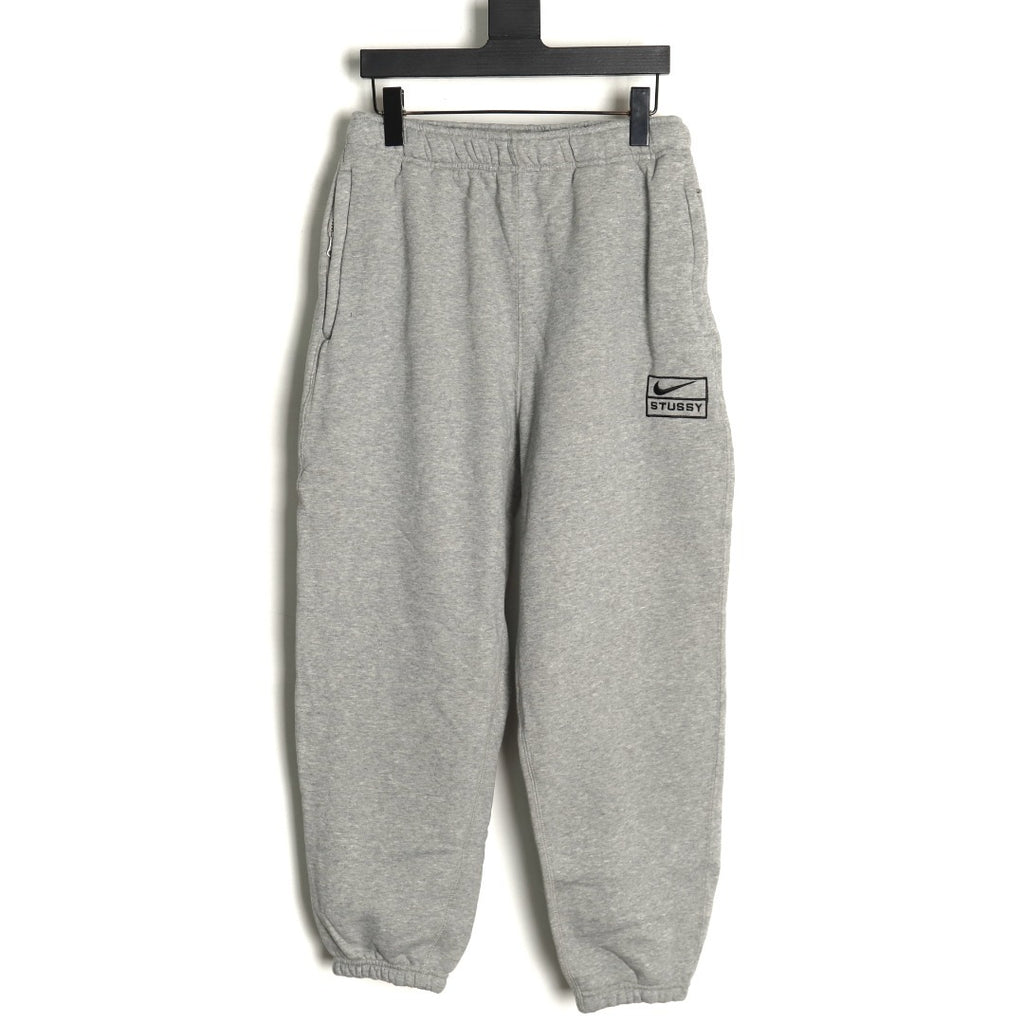 Nike x Stussy 23SS Embroidered Fleece Sweatpants – Gray - front view
