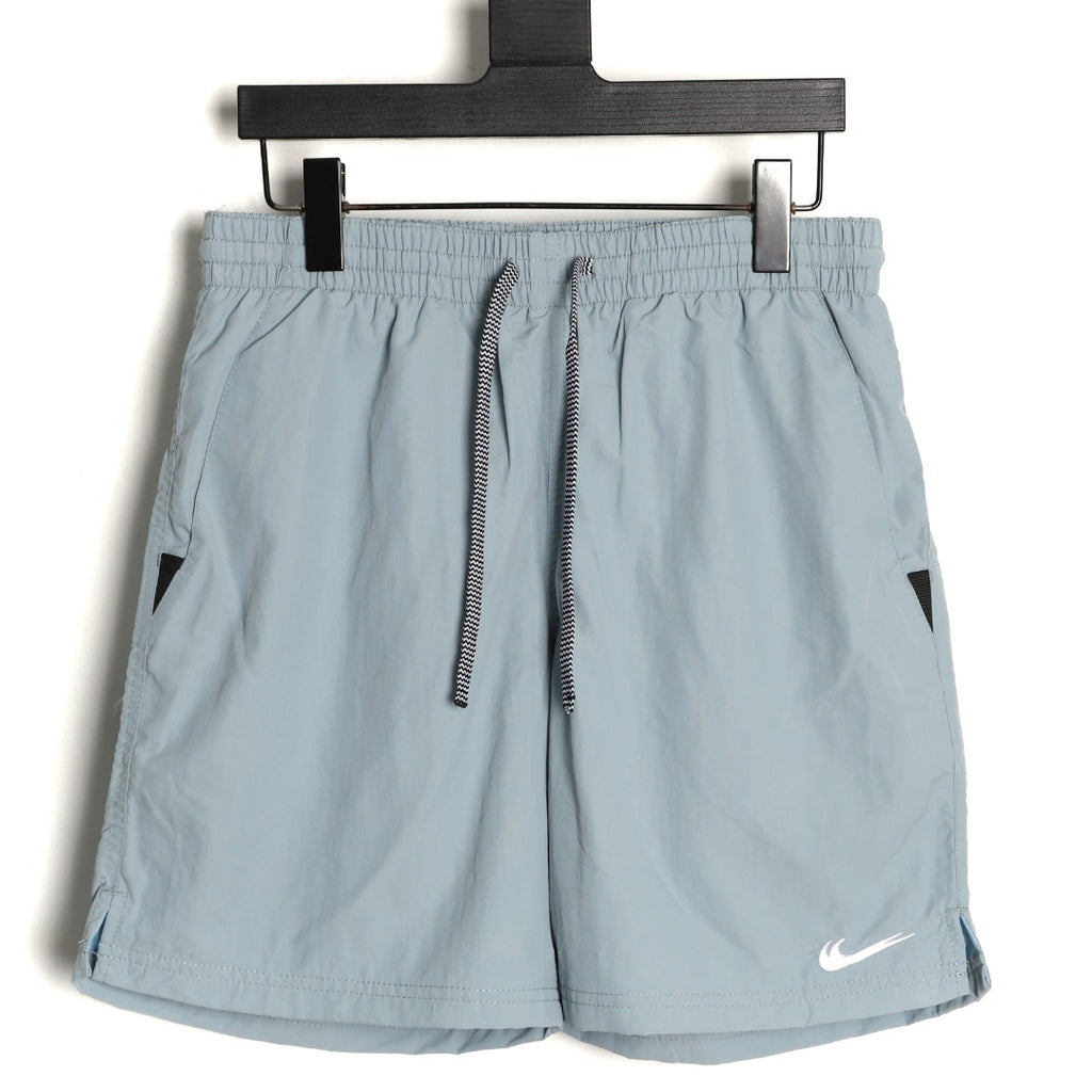 Nike Japan Double-Swoosh Woven Beach Shorts – Light Blue - front view