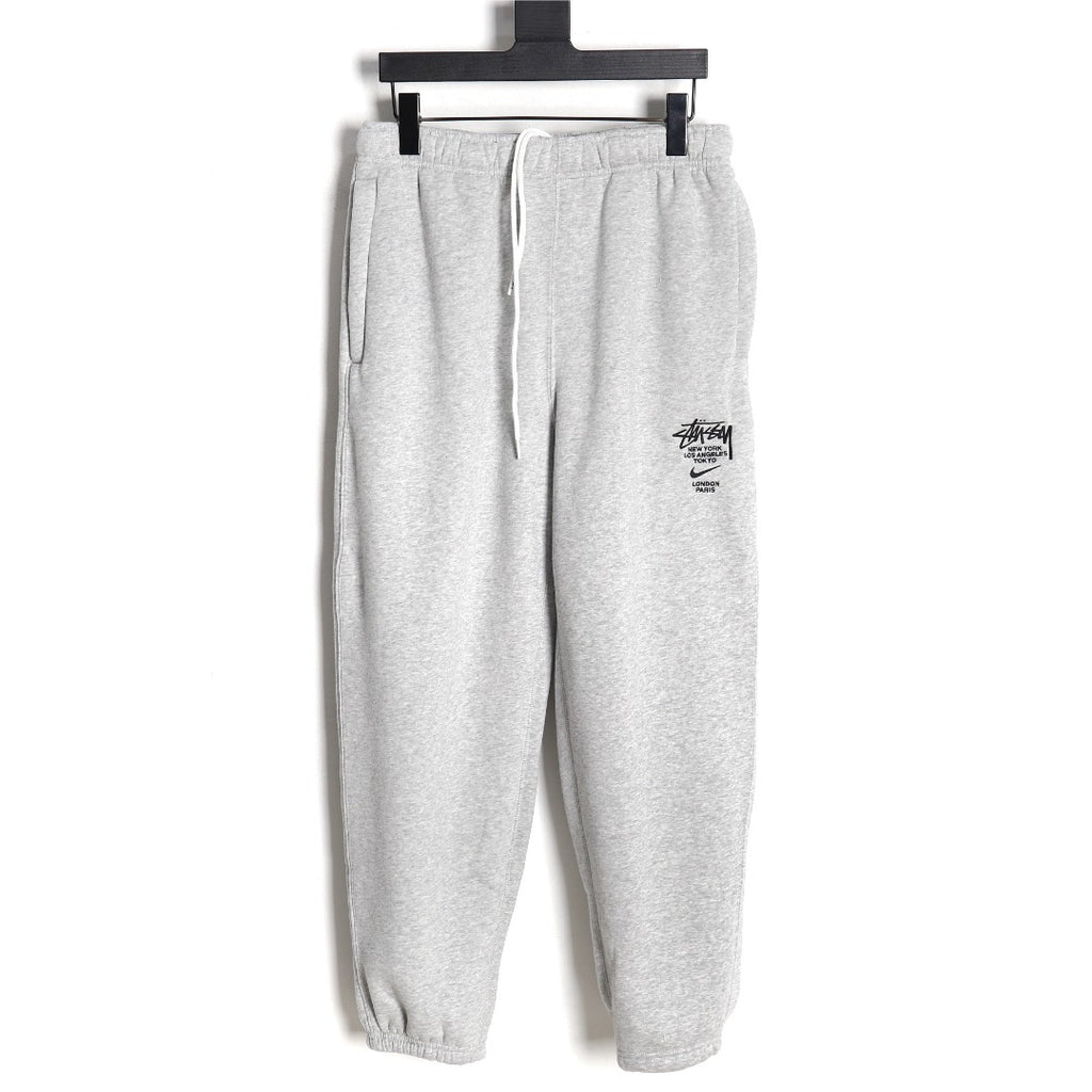 Nike x Stussy 23SS Embroidered Fleece Sweatpants – Light Gray - front view
