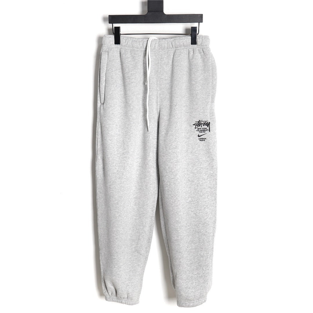 Nike x Stussy 23SS Embroidered Fleece Sweatpants – Light Gray - front view