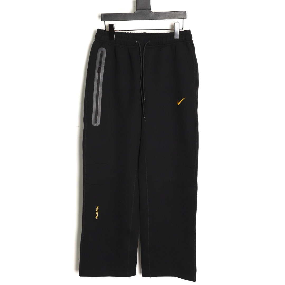 Nike x NOCTA Tech Fleece Logo Pants – Black and Gold - front view