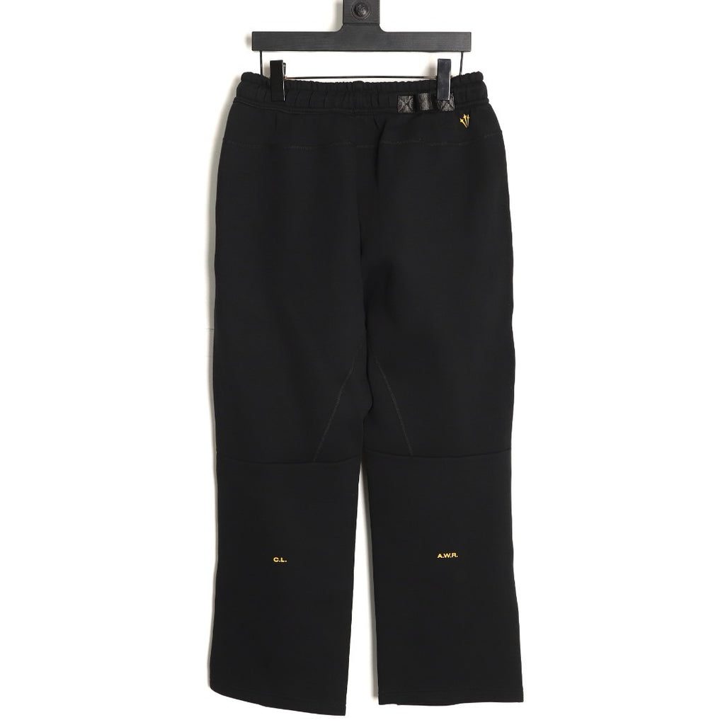 Nike x NOCTA Tech Fleece Logo Pants – Black and Gold - back view